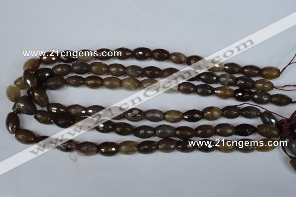 CAG3129 15.5 inches 10*14mm faceted rice brown line agate beads