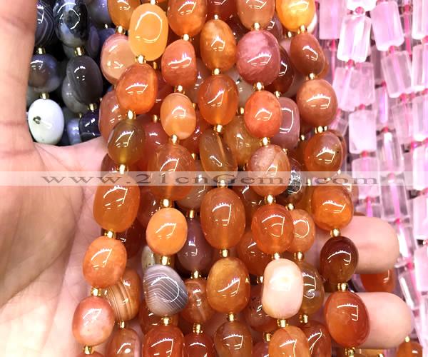 CNG9325 15 inches 10*14mm - 13*18mm nuggets red Botswana agate beads